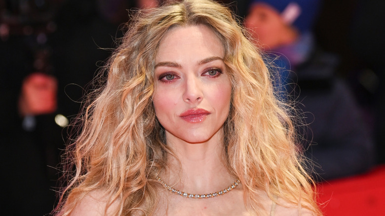 Amanda Seyfried posing at The Testament of Ann Lee premiere