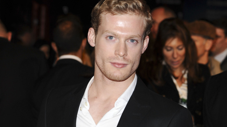 Sam Reid wearing Black Suit
