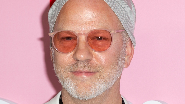 Ryan Murphy pink glasses light beard