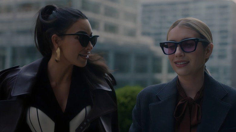 Siobhan and Anna sunglasses coats talking