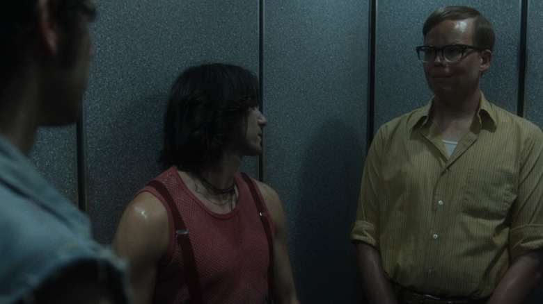 Mr. Whitely and two people in an elevator