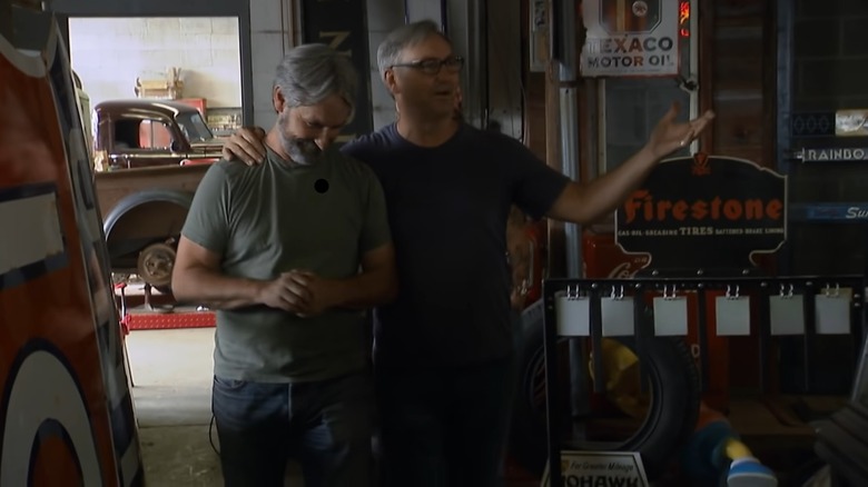 Robbie Wolfe with his arm around brother Mike Wolfe