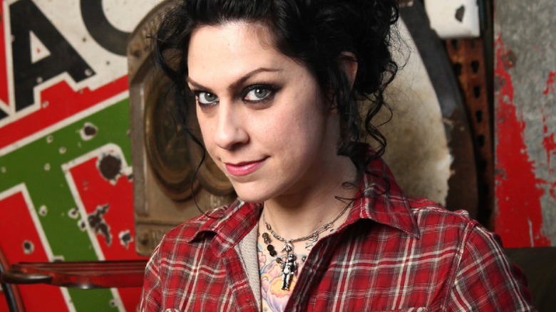 Danielle Colby smirking