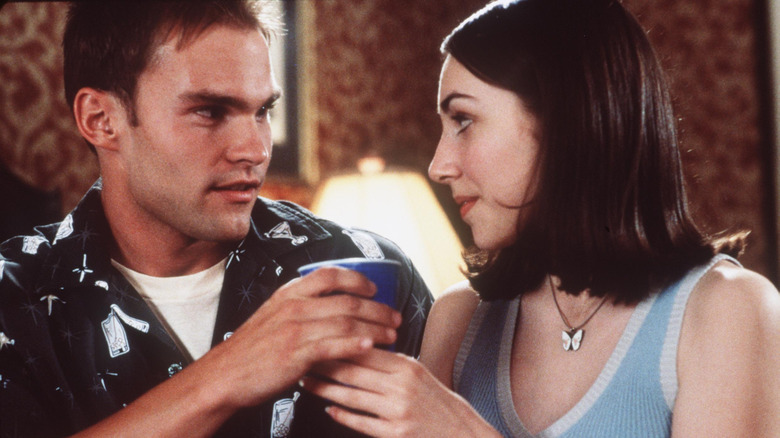 Stifler handing a drink to a potential conquest