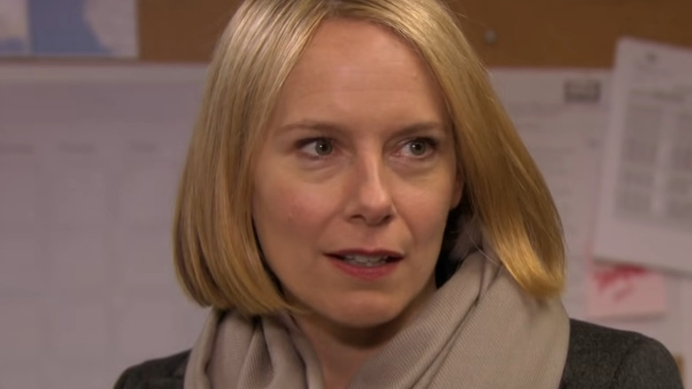 Amy Ryan looking to the side