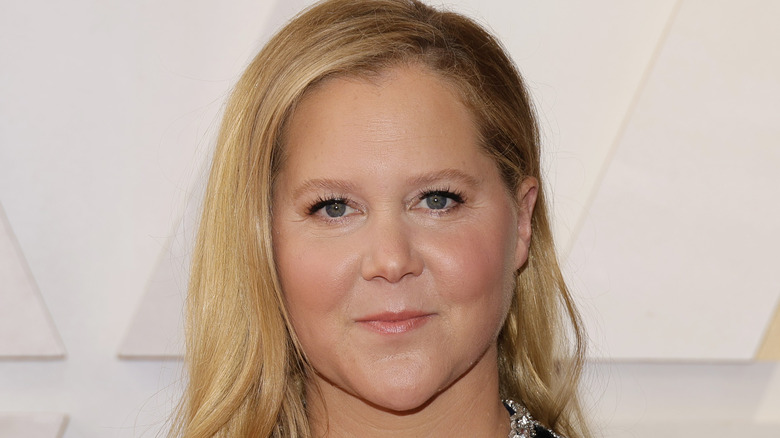 Amy Schumer on the red carpet at the Oscars