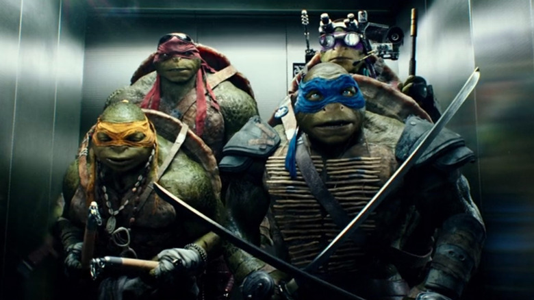 Raphael, Donnie, Mikey, and Leo in an elevator in 