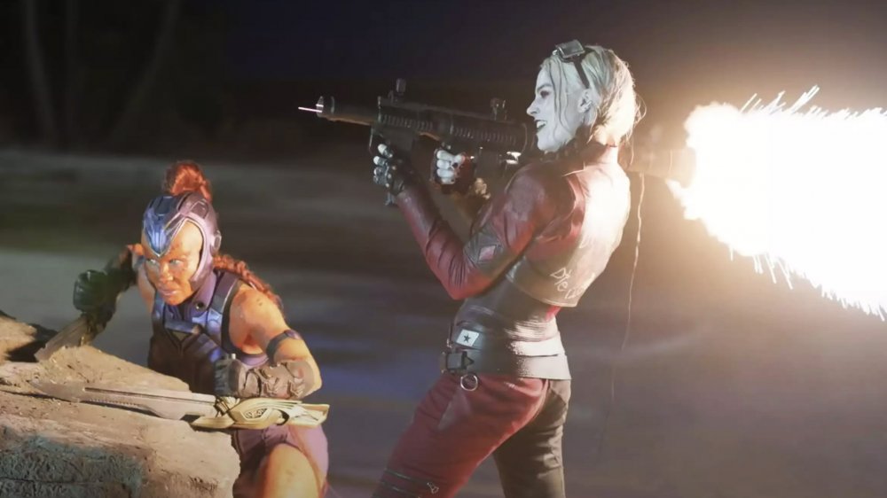 Harley Quinn with a flaming gun in The Suicide Squad