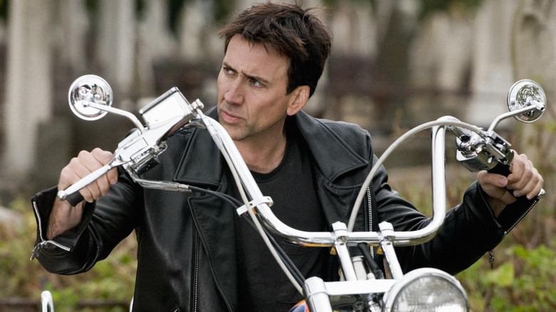 Johnny sitting on his motorcycle in 