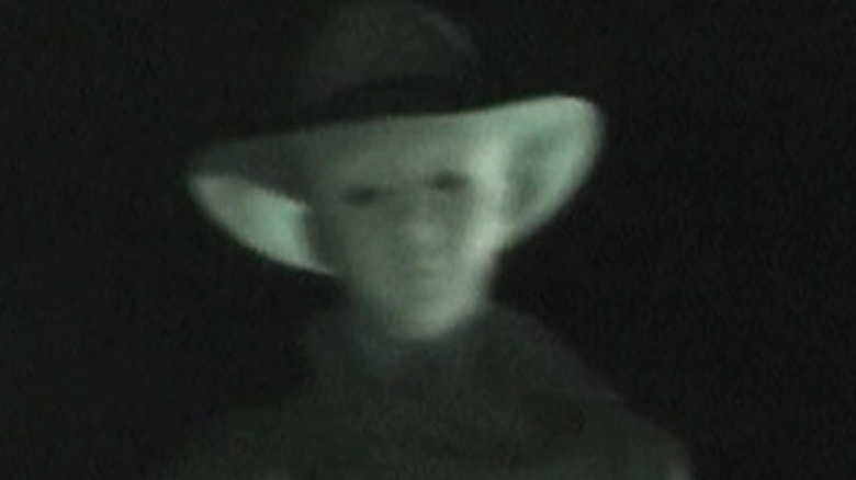 A ghostly figure appears in "No Through Road" (2009)