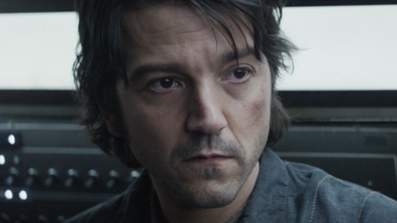Cassian Andor stares out of a cockpit window