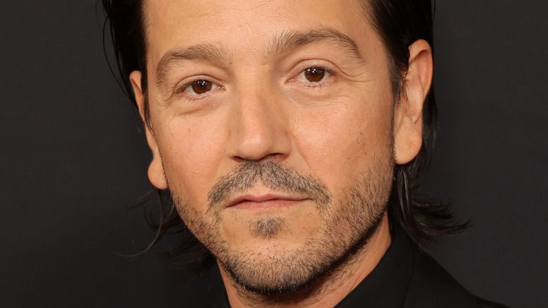 Diego Luna black shirt stubble