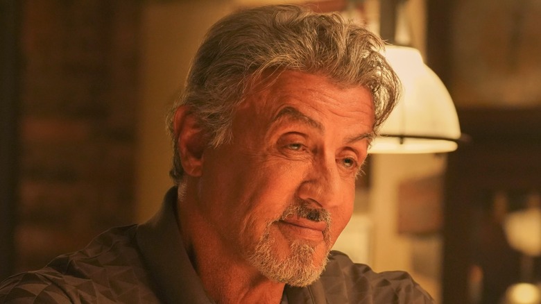 Sylvester Stallone smiling in Tulsa King