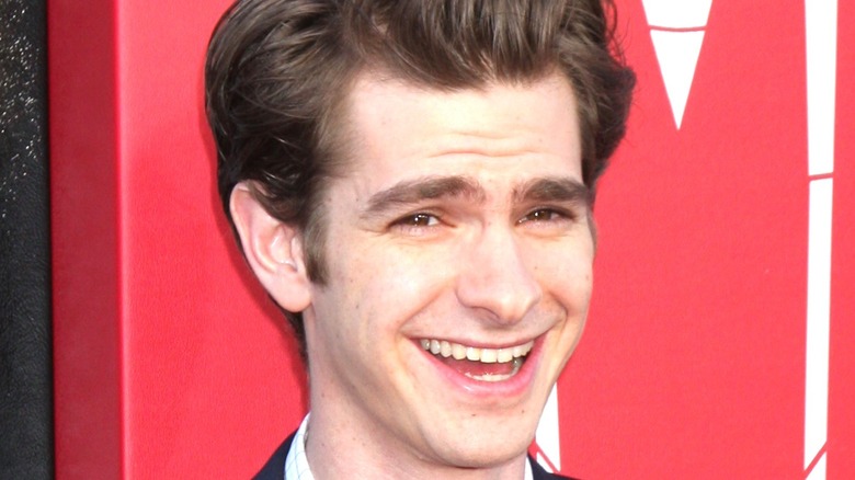 Andrew Garfield smiling at event