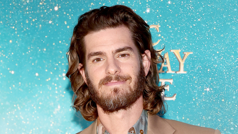 Andrew Garfield with shoulder-length hair