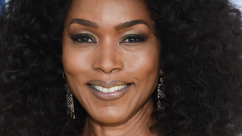 Angela Basset smiling big