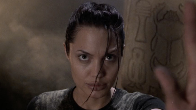 Lara Croft with dirt on her shoulders