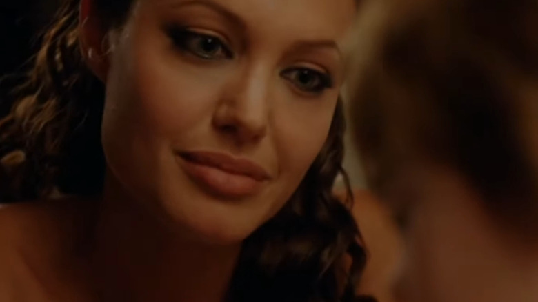 Jolie looking at young boy