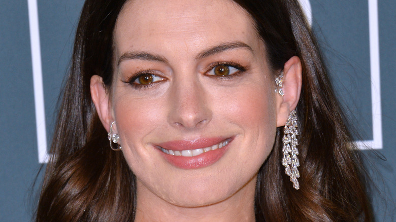 Anne Hathaway attends an event. 