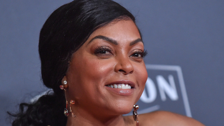 Taraji P. Henson smiling and waving