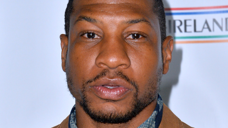 Jonathan Majors on red carpet