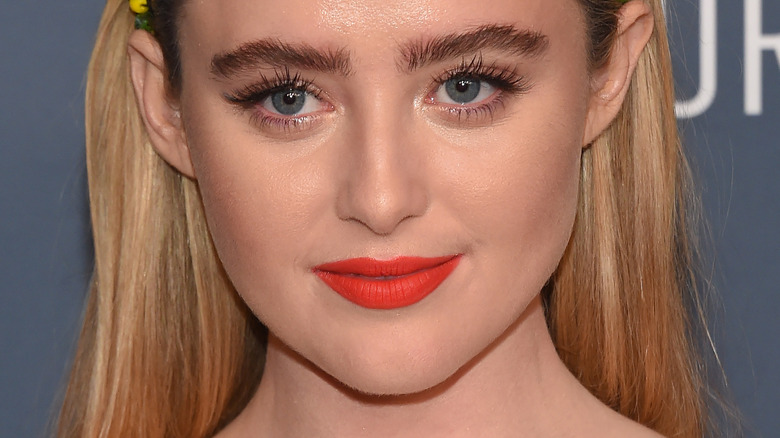 Kathryn Newton smiling at event