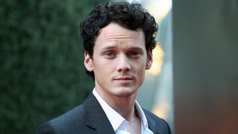 Anton Yelchin looking into camera