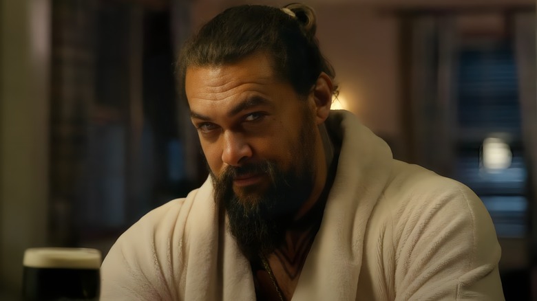 Aquaman sitting in robe