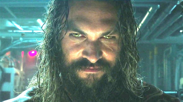 Jason Mamoa smirks