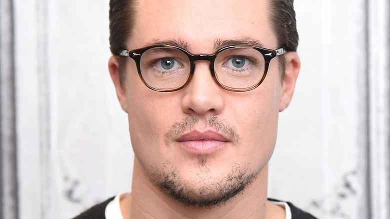 Alexander Dreymon wearing glasses