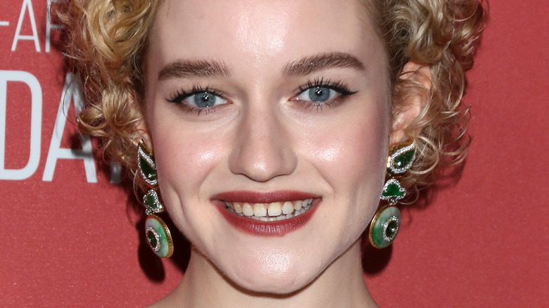 Julia Garner wearing red lipstick