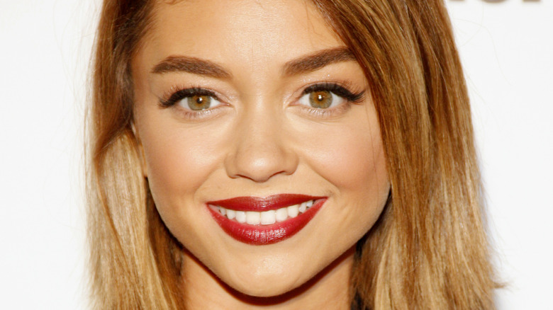 Sarah Hyland smiling on red carpet