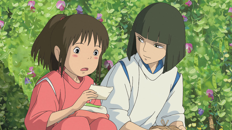 Haku watching Chihiro read a note in 