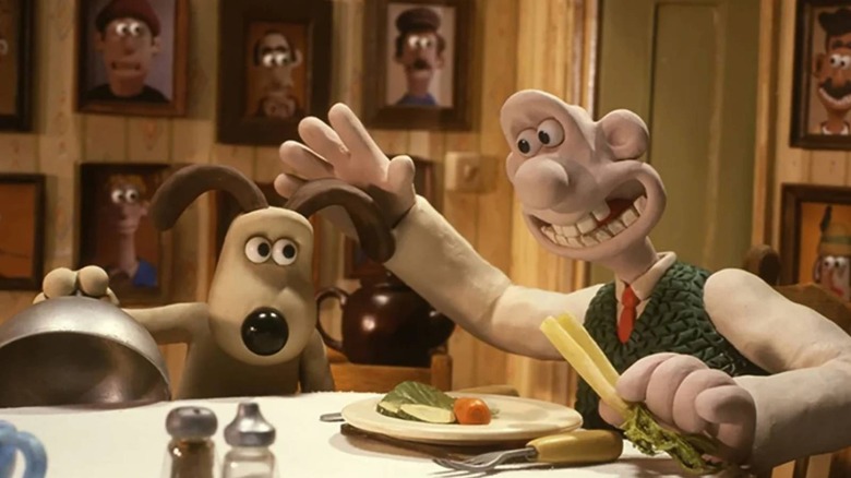 Wallace petting Gromit