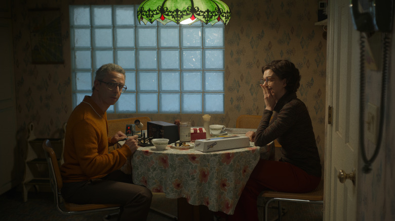 Strong and Hathaway at kitchen table