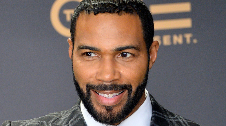 Omari Hardwick smiling red carpet