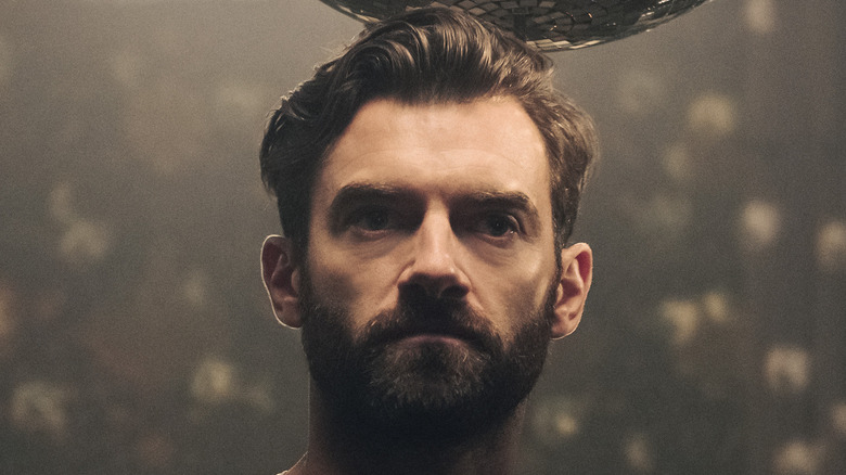 Stuart Martin frowning in "Army of Thieves"