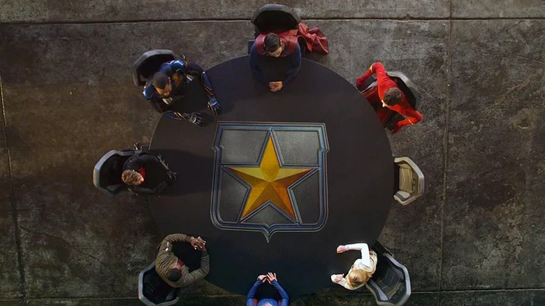 Seven heroes gather together at the Hall of Justice in honor of Green Arrow on Legends of Tomorrow (2016-2022)