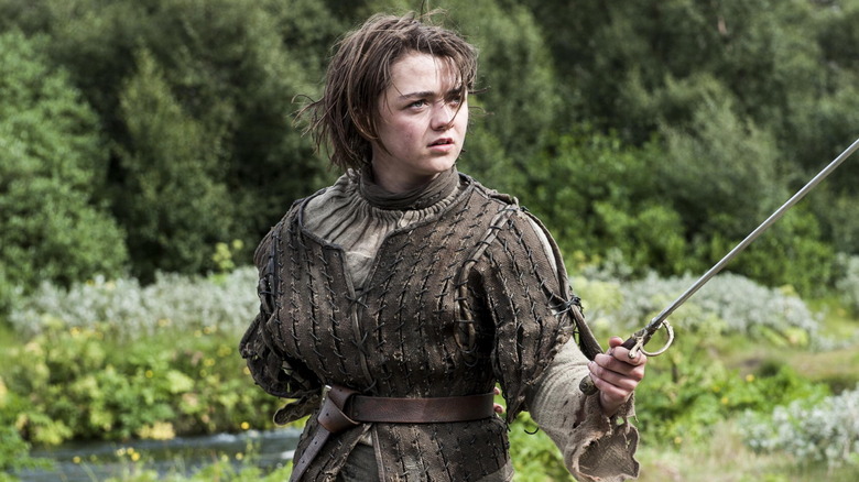 Arya trains with a sword