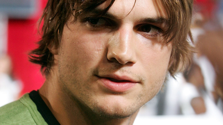 Ashton Kutcher smirking 