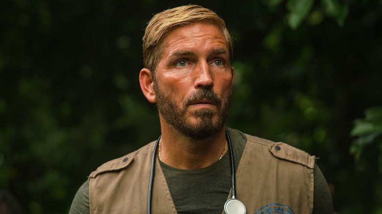 Tim Ballard stands in a jungle