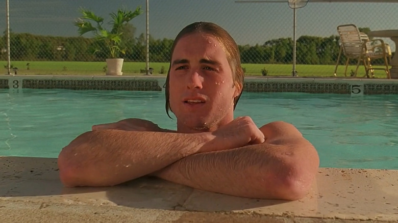 Anthony in a pool, leaning against the edge, in "Bottle Rocket."