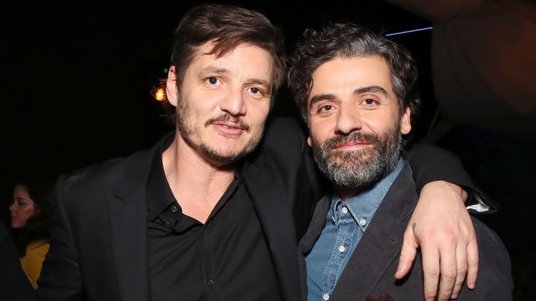 Pedro pascal and Oscar Isaac at event