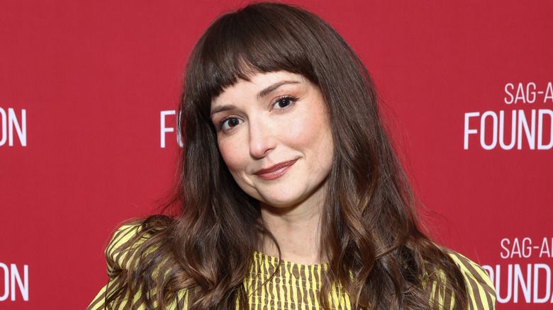 Milana Vayntrub posing at a SAG-AFTRA event