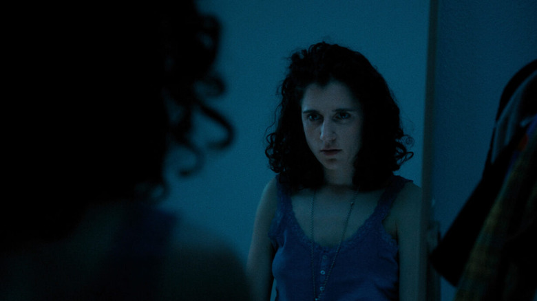 Leah (Ellie Kendrick) looks in the mirror
