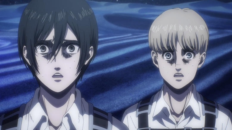 Mikasa and Armin staring in horror
