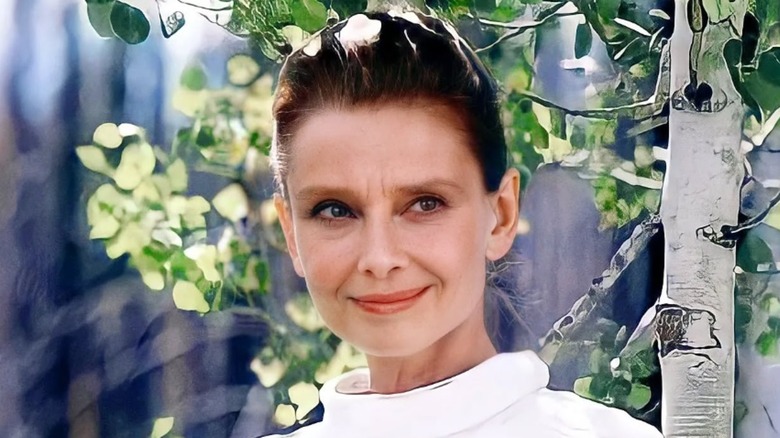 Hap smiling at Pete from beneath a tree in 1989's Always