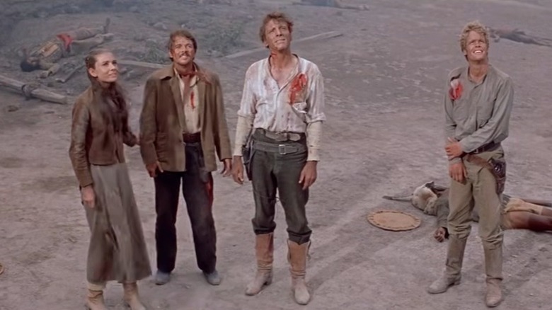 The Zachary family stands, injured but united, in "The Unforgiven" (1960)