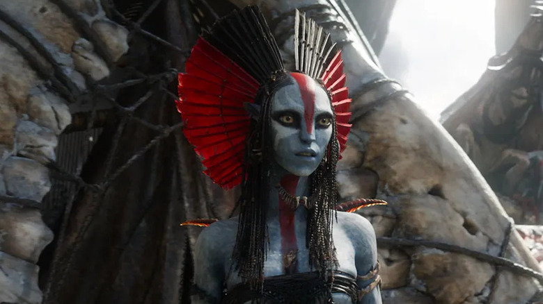 Varang walking out of structure in "Avatar: Fire and Ash"