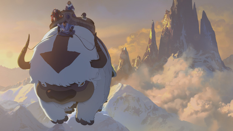Team Avatar riding Appa over mountains in "Avatar Aang: The Last Airbender" (2026)